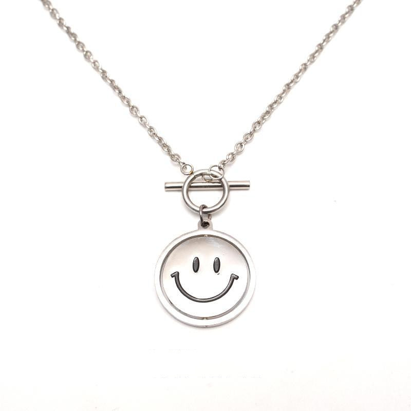 笑顔泣き顔ネックレス｜ダブル飾り小物の商品イメージ